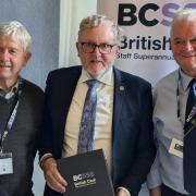 Dumfriesshire, Clydesdale and Tweeddale MP David Mundell, centre, with pension scheme member Robert Jardine from Kirkconnel, left, and James Grant, a fund trustee.